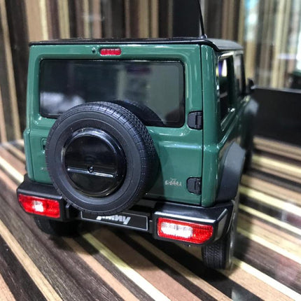 LCD Model Suzuki Jimny Dark Green 1:18 Diecast Model Car - studio product photo of the scale model