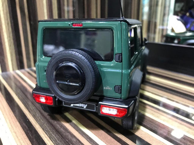 LCD Model Suzuki Jimny Dark Green 1:18 Diecast Model Car - studio product photo of the scale model