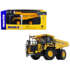 https://cdn.shopify.com/s/files/1/0504/9925/6496/products/komatsu-hd605-8-dump-truck-150-diecast-model-by-first-gear-984880.jpg?v=1748420904