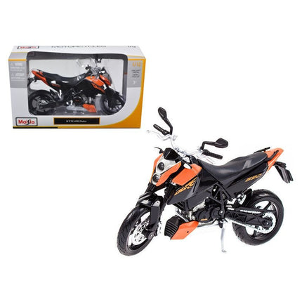 https://cdn.shopify.com/s/files/1/0504/9925/6496/files/ktm-690-duke-orange-and-black-112-diecast-motorcycle-model-by-maisto-611997.jpg?v=1760624522
