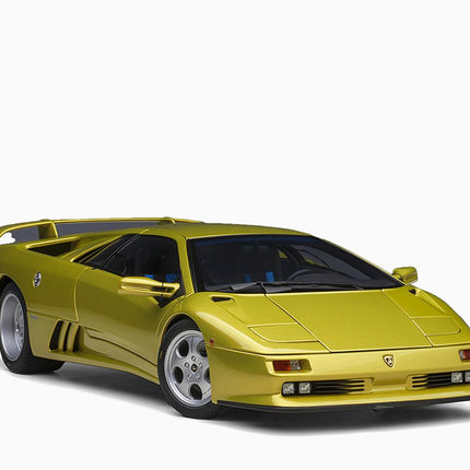 https://www.mydiecastcars.com/wp-content/uploads/2023/01/lamborghini-diablo-se30-yellow-autoart-1.jpg