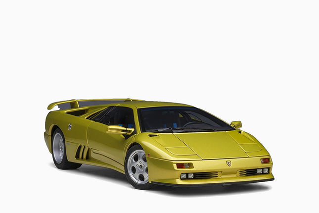 https://www.mydiecastcars.com/wp-content/uploads/2023/01/lamborghini-diablo-se30-yellow-autoart-1.jpg
