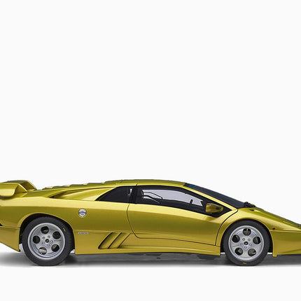 https://www.mydiecastcars.com/wp-content/uploads/2023/01/lamborghini-diablo-se30-yellow-autoart-3.jpg