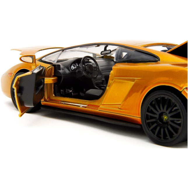 https://cdn.shopify.com/s/files/1/0504/9925/6496/files/lamborghini-gallardo-gold-metallic-fast-x-2023-movie-fast-furious-series-124-diecast-model-car-by-jada-196918.jpg?v=1748419127