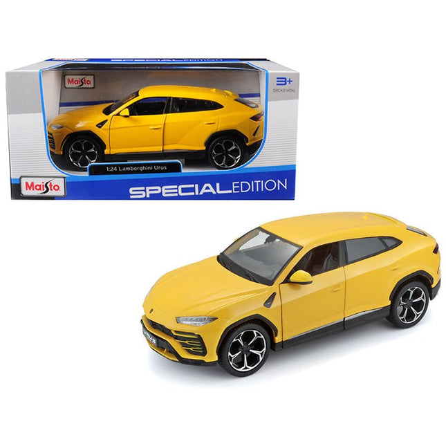https://cdn.shopify.com/s/files/1/0504/9925/6496/files/lamborghini-urus-yellow-124-diecast-model-car-by-maisto-826640.jpg?v=1748418494