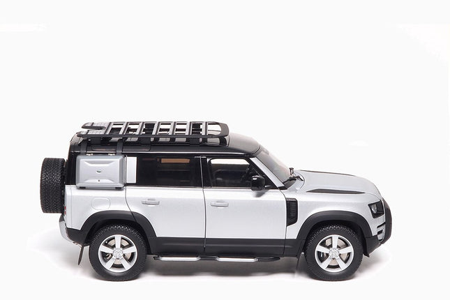 https://www.mydiecastcars.com/wp-content/uploads/2022/08/land-rover-defender-110-silver-almost-real-2.jpg