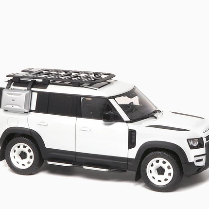 https://www.mydiecastcars.com/wp-content/uploads/2022/09/land-rover-defender-110-white-3-4.jpg