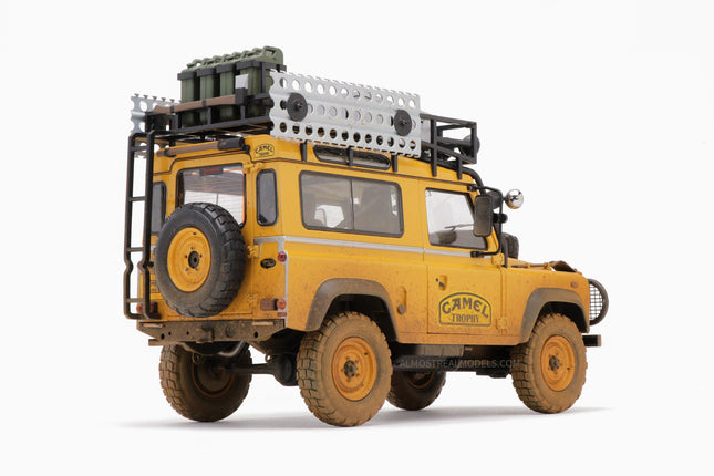 https://www.mydiecastcars.com/wp-content/uploads/2020/07/land-rover-defender-90-camel-trophy-borneo-dirty-2w.jpg