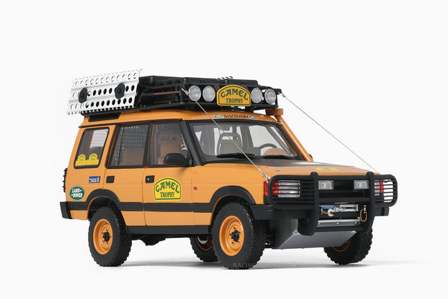 https://www.mydiecastcars.com/wp-content/uploads/2022/06/land-rover-discovery-camel-trophy-1w.jpg