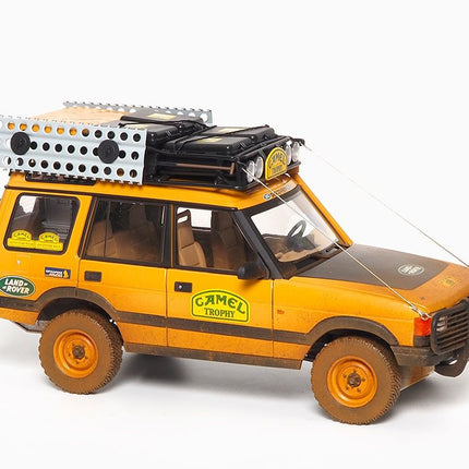 https://www.mydiecastcars.com/wp-content/uploads/2022/09/land-rover-discovery-camel-trophy-dirty-almost-real-1.jpg