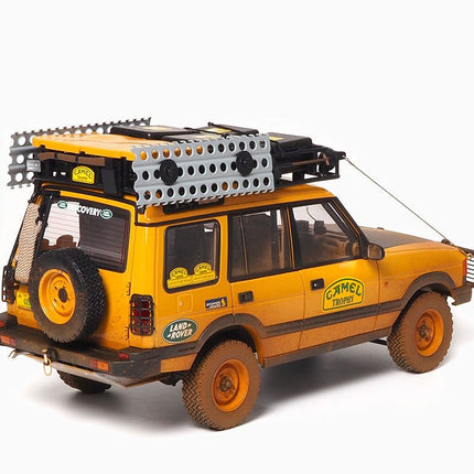 https://www.mydiecastcars.com/wp-content/uploads/2022/09/land-rover-discovery-camel-trophy-dirty-almost-real-2.jpg
