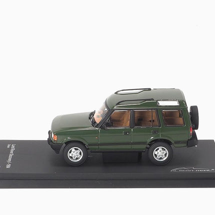 https://www.mydiecastcars.com/wp-content/uploads/2020/10/land-rover-discovery-green-43-2.jpg