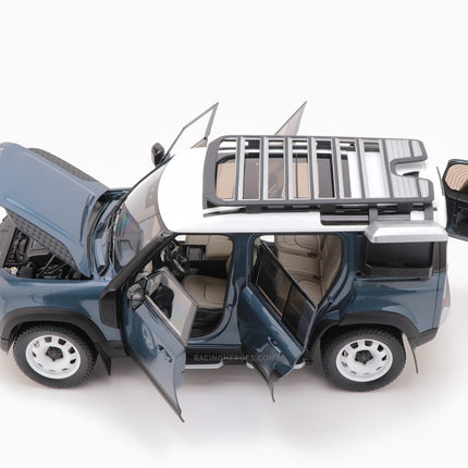 https://www.mydiecastcars.com/wp-content/uploads/2020/11/landrover-defender-110-tasman-blue-4w.jpg