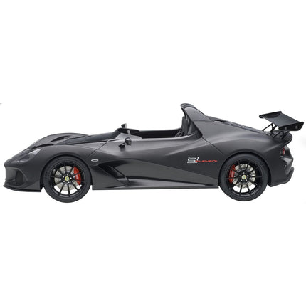 https://cdn.shopify.com/s/files/1/0504/9925/6496/files/lotus-3-eleven-matt-black-with-gloss-black-accents-118-model-car-by-autoart-668399.jpg?v=1748416532
