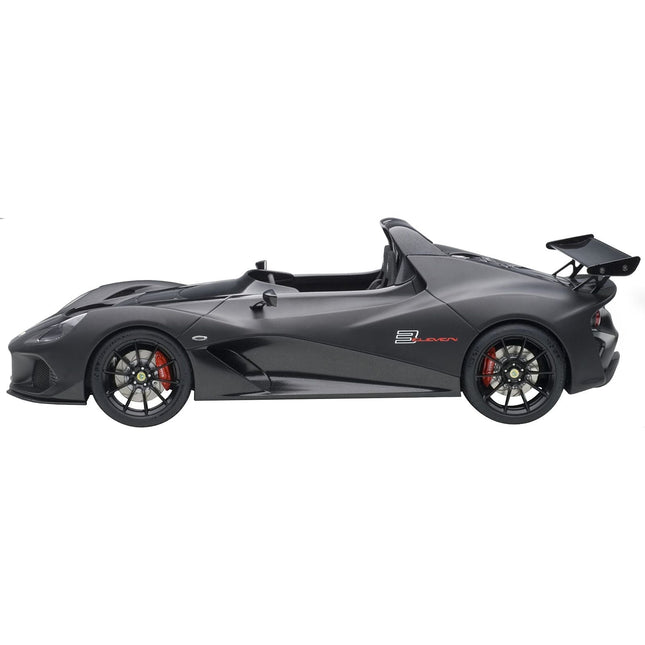 https://cdn.shopify.com/s/files/1/0504/9925/6496/files/lotus-3-eleven-matt-black-with-gloss-black-accents-118-model-car-by-autoart-668399.jpg?v=1748416532