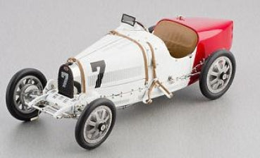 1:18 scale vintage race car diecast model with white body, red rear, and number 7 on hood