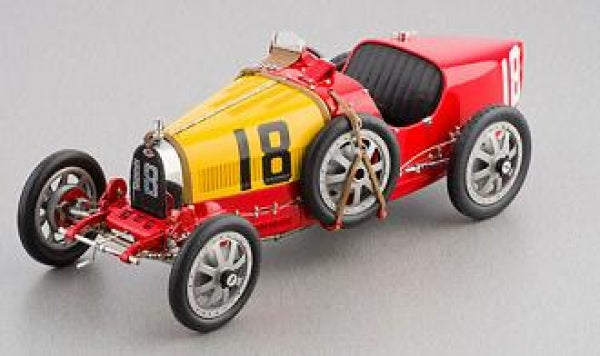 Diecast vintage race car model with yellow hood, red body, number 18, and exposed engine details