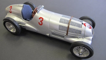 1:18 scale diecast vintage silver race car model with red number 3, blue seat, and spoked wheels