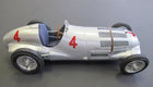 1:18 scale diecast classic silver race car model with red number 4, detailed wheels