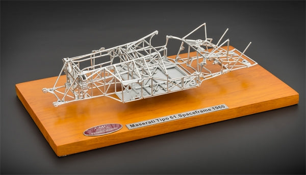 Maserati Tipo 61 diecast model spaceframe chassis on a wooden display base