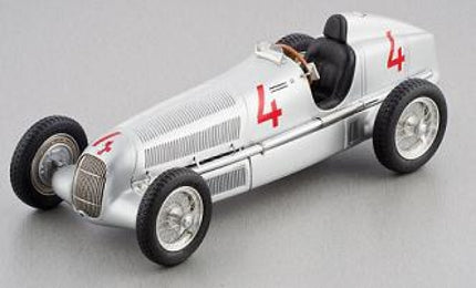 Silver vintage race car diecast model with red number 4, black seat, and detailed wheels