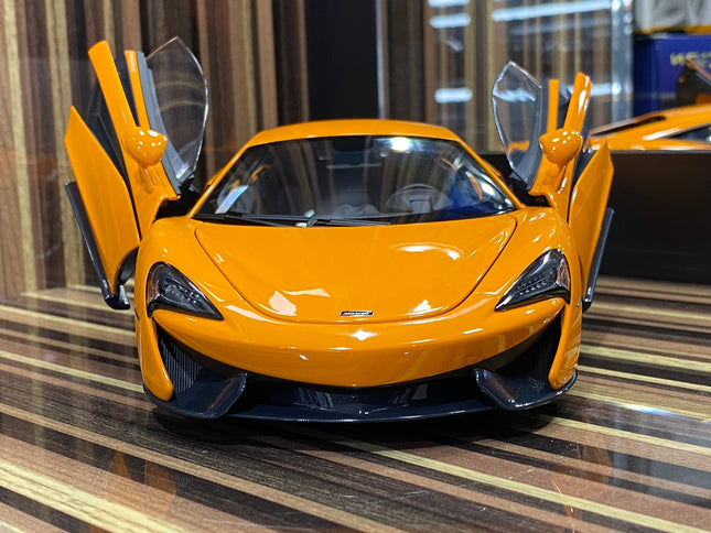 AutoArt McLaren 570S Orange 1:18 Diecast Model Car - studio product photo of the scale model