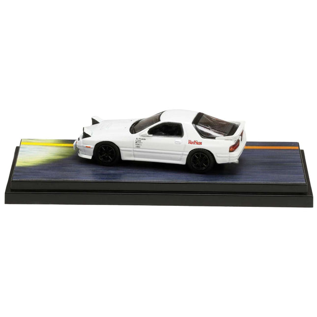 https://cdn.shopify.com/s/files/1/0504/9925/6496/files/mazda-rx-7-fc3s-rhd-right-hand-drive-white-redsuns-with-ryosuke-takahashi-driver-figure-initial-d-1995-2013-manga-164-diecast-model-car-by-hobby-japan-138528.jpg?v=1748404187