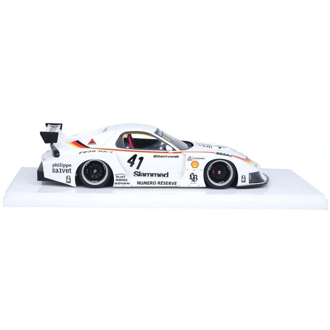 https://cdn.shopify.com/s/files/1/0504/9925/6496/files/mazda-rx7-fd3s-lb-super-silhouette-rhd-right-hand-drive-41-white-with-stripes-and-graphics-118-model-car-by-inno-models-496087.jpg?v=1756086952