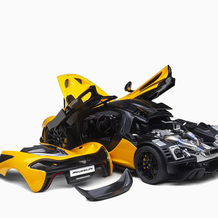 https://www.mydiecastcars.com/wp-content/uploads/2023/01/mclaren-p1-yellow-autoart-4.jpg