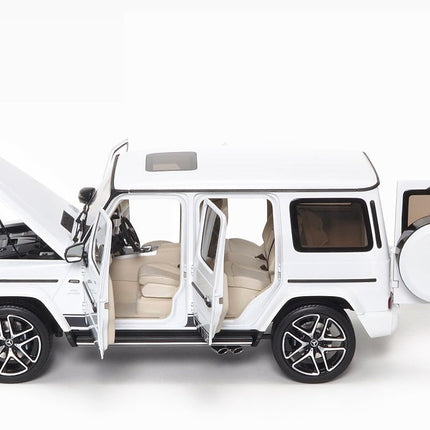 https://www.mydiecastcars.com/wp-content/uploads/2022/09/mercedes-amg-g-63-white-almost-real-3.jpg
