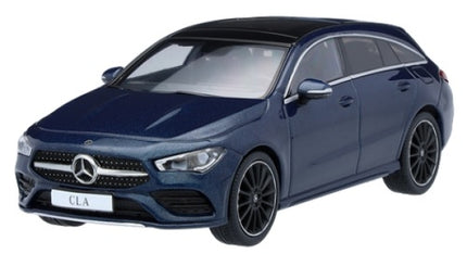 1:43 scale diecast Mercedes-Benz CLA AMG model car in denim blue, front view