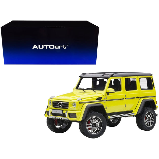 https://cdn.shopify.com/s/files/1/0504/9925/6496/files/mercedes-benz-g500-4x4-2-electric-beam-yellow-118-model-car-by-autoart-809037.jpg?v=1748416529