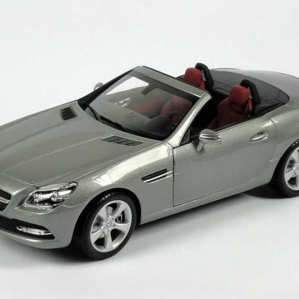 Minichamps Mercedes-Benz SLK R172 2011 Palladium Silver Metallic 1:18 scale model car, elevated front view showing the bonnet and red interior