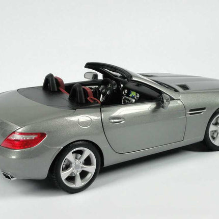 Minichamps Mercedes-Benz SLK R172 2011 Palladium Silver Metallic 1:18 scale model car, rear three-quarter view showing the dashboard and red seats