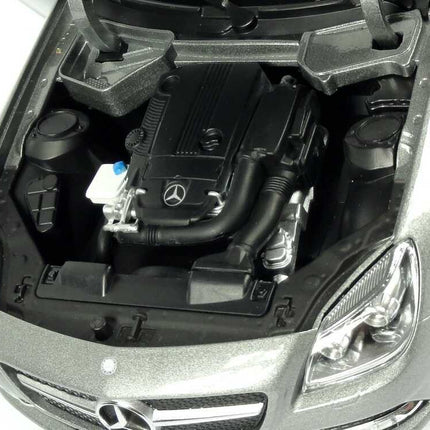 Minichamps Mercedes-Benz SLK R172 2011 Palladium Silver Metallic 1:18 scale model car, close-up of the engine bay under the opening bonnet