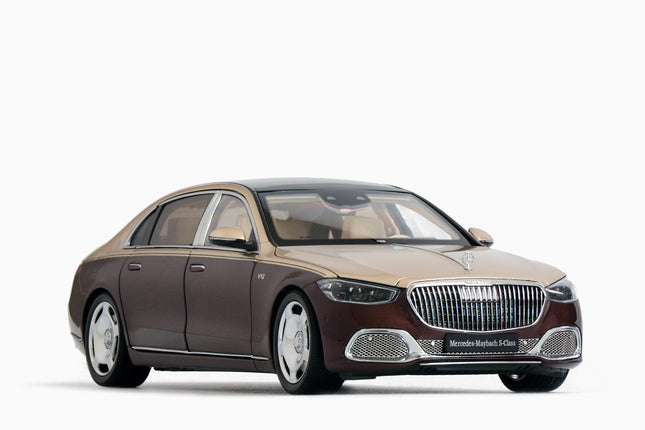 https://www.mydiecastcars.com/wp-content/uploads/2023/09/mercedes-maybach-red-gold-almost-real-1w.jpg