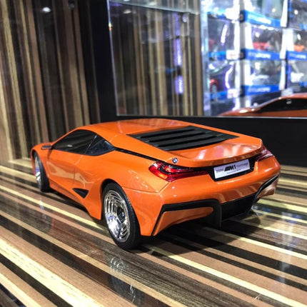 Minichamps 1/18 Resin BMW M1 Hommage Orange Model Car - studio product photo of the scale model