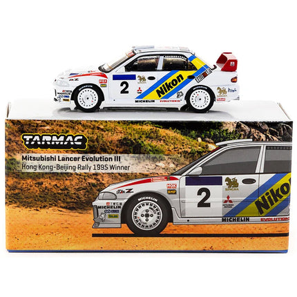 https://cdn.shopify.com/s/files/1/0504/9925/6496/files/mitsubishi-lancer-evolution-iii-2-kenneth-eriksson-staffan-parmander-winner-hong-kong-beijing-rally-1995-global64-series-164-diecast-model-by-tarmac-works-971566.jpg?v=1756087155