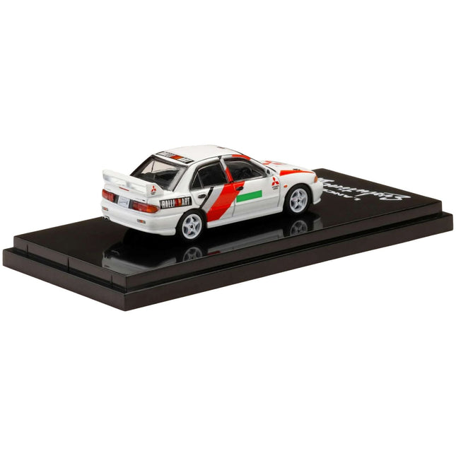 https://cdn.shopify.com/s/files/1/0504/9925/6496/files/mitsubishi-lancer-rs-evolution-iii-rhd-right-hand-drive-scortia-white-groupe-a-promotion-164-diecast-model-car-by-hobby-japan-408736.jpg?v=1748404273