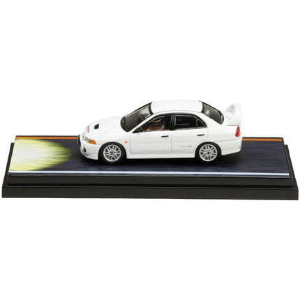 https://cdn.shopify.com/s/files/1/0504/9925/6496/files/mitsubishi-lancer-rs-evolution-iv-rhd-right-hand-drive-white-monstar-with-seiji-iwaki-driver-figure-initial-d-1995-2013-manga-164-diecast-model-car-by-hobby-jap-575048.jpg?v=1748404173