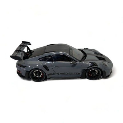 Minichamps 1/18 Porsche 911 GT3 RS Diecast Model Car Grey/Carbon - studio product photo of the scale model