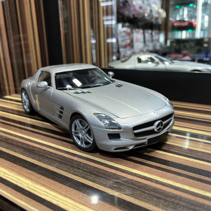 Minichamps Mercedes-Benz SLS 1/18 Diecast Model Matt Silver - studio product photo of the scale model