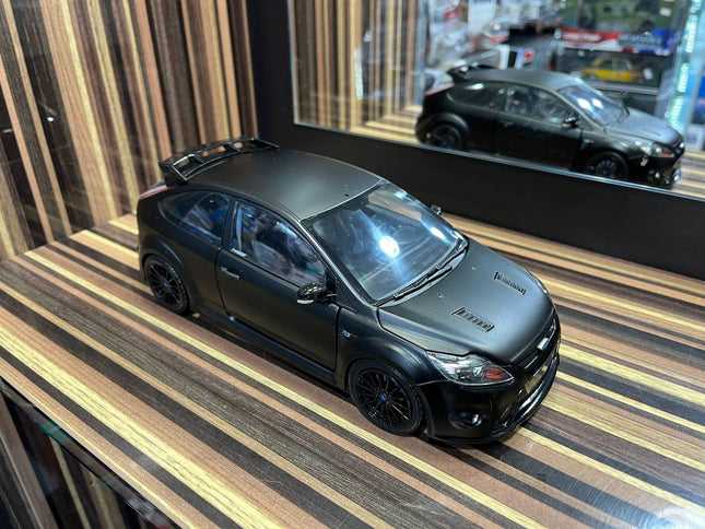 Minichamps Ford Focus RS500 1/18 Diecast Model All Opening Matt Black - studio product photo of the scale model