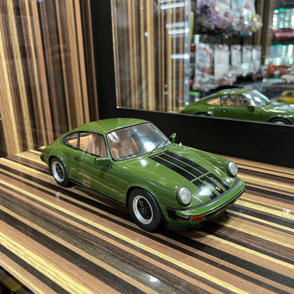 Solido Porsche 911 Carrera 1/18 Diecast Model Green Partial Opening - studio product photo of the scale model