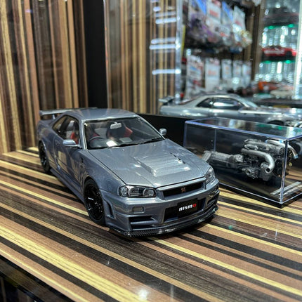 MotorHelix Nissan Skyline GT-R34 Nismo 1/18 Diecast Model Gun Metallic - studio product photo of the scale model