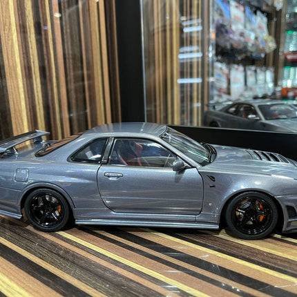 MotorHelix Nissan Skyline GT-R34 Nismo 1/18 Diecast Model Gun Metallic - collectible scale model car