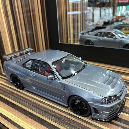 MotorHelix Nissan Skyline GT-R34 Nismo 1/18 Diecast Model Gun Metallic - detailed collector display model