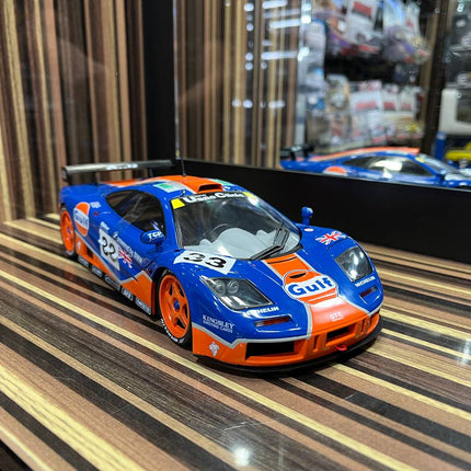 Solido McLaren F1 GTR 1/18 Diecast Model Partially Opening Blue - studio product photo of the scale model