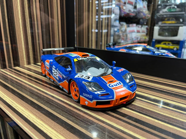 Solido McLaren F1 GTR 1/18 Diecast Model Partially Opening Blue - studio product photo of the scale model