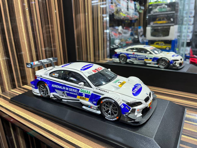 Minichamps BMW M3 DTM 1/18 Diecast Model White Blue - studio product photo of the scale model